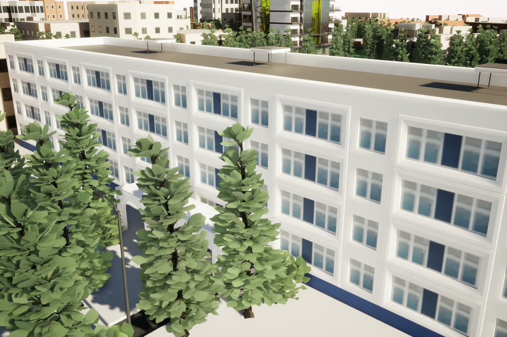 Five-storey elementary school building with rows of windows, near the tower.