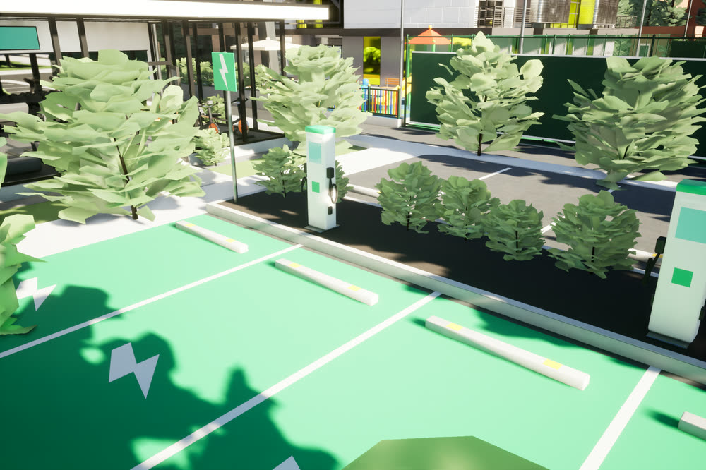EV charging bays painted green, with charging posts, lined with trees.